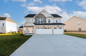 Clarksville house for rent - a large house with a driveway in front of it