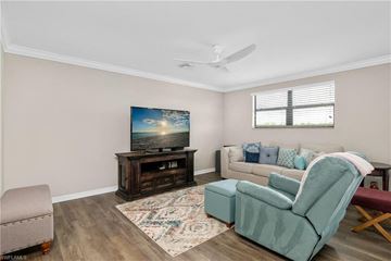 Estero house for rent - a living room with a couch and a tv