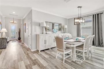Estero house for rent - a dining room and living room with a table and chairs