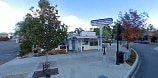 Vista apartment for rent - a city street with a street sign and trees