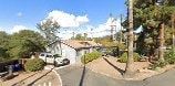 Vista Ca apartment for rent - a blurry photo of a street with a house and cars