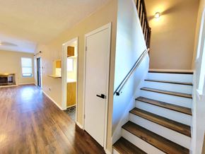 Killeen house for rent - the entryway of a home with stairs and a door leading to a living room
