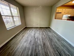 Shepherdsville apartment for rent - an empty living room with wooden floors and a window