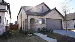 Royse City house for rent - A house with a garage and a driveway.