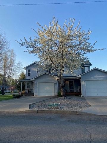 Coeur D Alene house for rent - a house with a tree in front of it