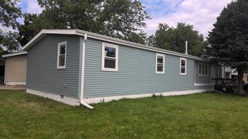 Wood River house for rent - a blue house with a white roof and a lawn