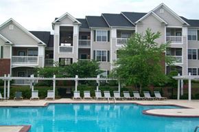 Hickory apartment for rent - an apartment building with a large swimming pool