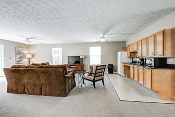 Millersburg apartment for rent - a living room with a couch and a kitchen