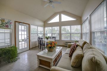 Kokomo apartment for rent - a large living room with a couch and a table