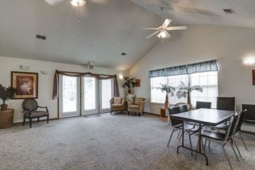 Morgantown apartment for rent - a living room with a dining room table and a ceiling fan