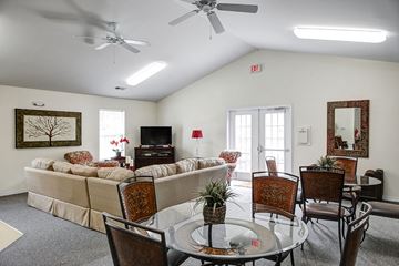 Goose Creek apartment for rent - a living room with a glass table and a couch