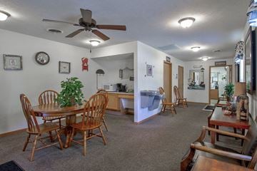 Michigan Center apartment for rent - a living room and dining room with a table and chairs