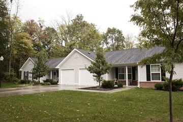 Three Rivers apartment for rent - a white house with a yard and trees