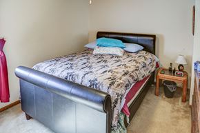 Richwood apartment for rent - a bedroom with a bed and a dresser