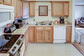 Richwood apartment for rent - a kitchen with a stove microwave and sink