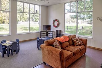 Richwood apartment for rent - a living room with a couch and chairs and large windows