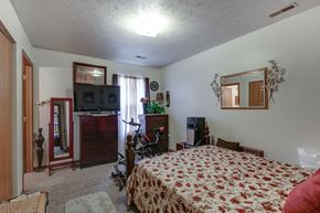 Cadiz apartment for rent - a bedroom with a bed and a tv