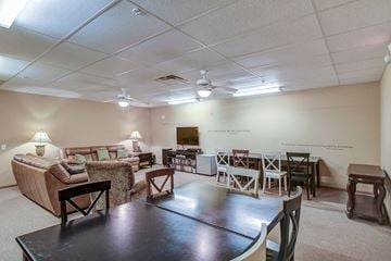 Durand apartment for rent - a living room with a table and a couch