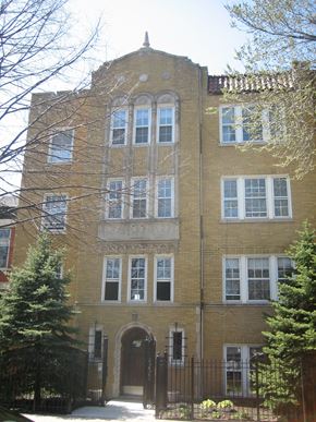 Chicago apartment for rent - a large brick building with a tower on top of it