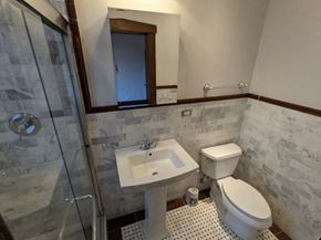 Chicago apartment for rent - a bathroom with a toilet and a sink and a shower
