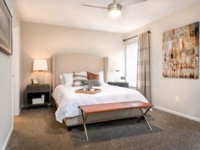 Westfield apartment for rent - A bedroom with a large bed and a painting on the wall.