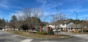 Lakeland apartment for rent - a roundabout in a neighborhood with houses and trees