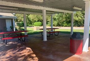 Lakeland apartment for rent - a picnic pavilion with benches and a trash can
