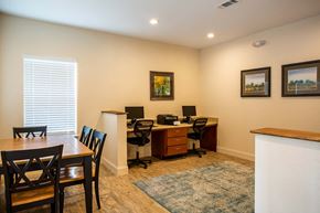 Macon apartment for rent - a home office with a table and chairs