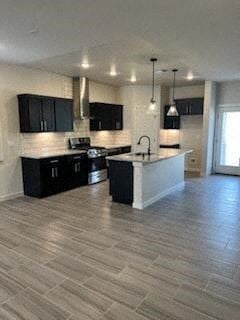 El Paso house for rent - a kitchen with black cabinets and a white counter top