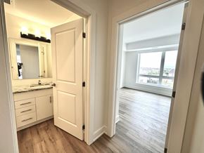 Kanata apartment for rent - A bathroom with a sink and mirror.
