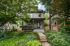 Columbus apartment for rent - A house with a front yard and a small garden.