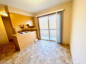 Delaware apartment for rent - an empty living room with a sliding glass door