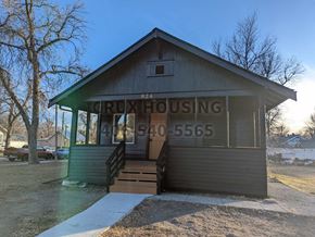 Great Falls house for rent - the front entrance of a church building with a porch