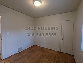 Great Falls house for rent - a bedroom with a hard wood floor and a closet