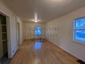 Great Falls house for rent - a living room with a hard wood floor and a window