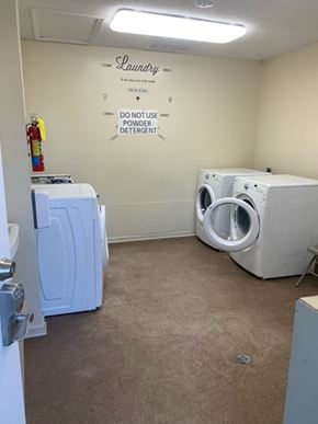 Lake Park apartment for rent - a laundry room with a washing machine and a dryer