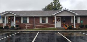 Ashburn apartment for rent - a red brick building with a porch and a rain