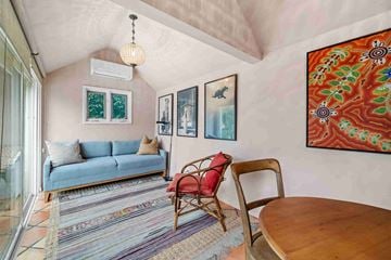 Santa Monica house for rent - a living room with a couch and a table and a window