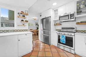 Santa Monica house for rent - a kitchen with a refrigerator and a stove and a microwave
