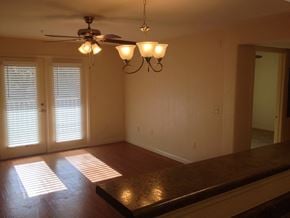 Hahira apartment for rent - a dining room with a table and a ceiling fan