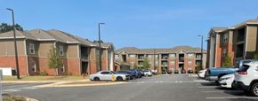 Columbus apartment for rent - an empty parking lot in front of an apartment building