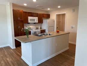 Columbus apartment for rent - a kitchen with a counter top and a refrigerator