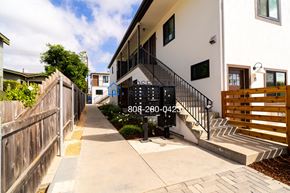 San Diego apartment for rent - a building with stairs and a sidewalk in front of it