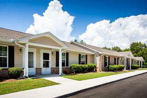 Blue Ridge apartment for rent - the front of a house with a sidewalk and grass