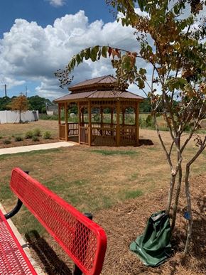 Albany apartment for rent - a gazebo in a park with a red bench