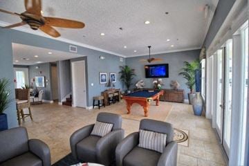 Bradenton house for rent - a large living room with a pool table