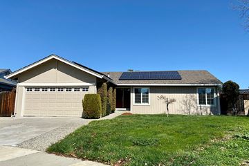Milpitas house for rent - A house with a garage and solar panels on the roof.