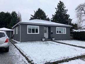 Victoria apartment for rent - a gray house with snow on the ground