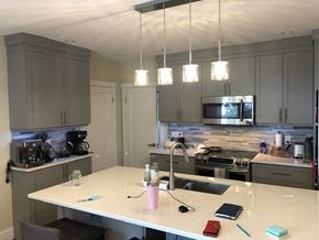 Victoria apartment for rent - a kitchen with a counter top and a sink