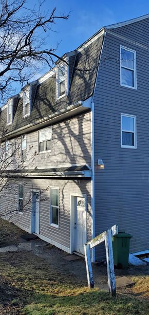 Trenton apartment for rent - a house with a tape measure in front of it